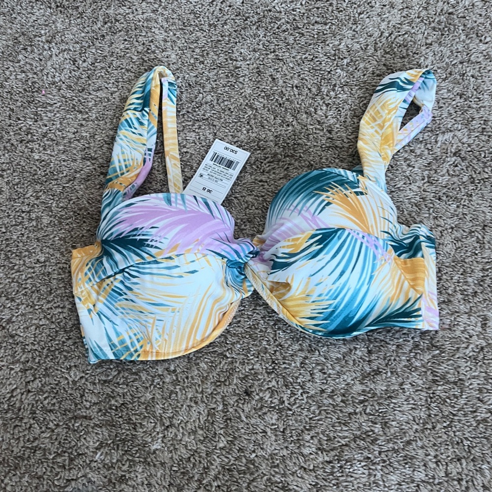 target swim suit the top is new and the bottoms hardly worn